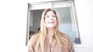 Young blonde girl gives a passionate blowjob under the table and receives a huge load of cum on her face