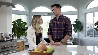 A pretty blonde has sex with her partner on the bed, he pushes hard