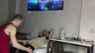 A petite girl has sex with her two friendly guys