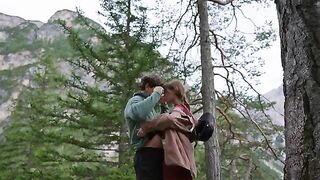 A couple makes love in the forest, overcome by nature’s powerful allure