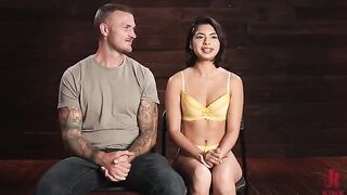 The sexual bondage of a girl who is tied up and screaming with pleasure