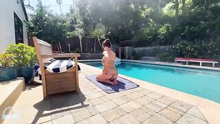 A big-breasted brunette has sex with her boyfriend by the pool
