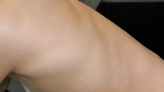 A cute girl has an intimate moment while her partner films in the mirror