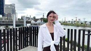 A signal of distress from a stunning young woman in a bikini