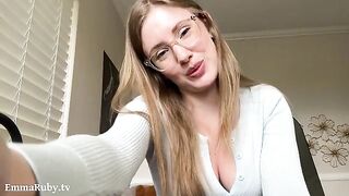 A girl with glasses takes care of her sexy body