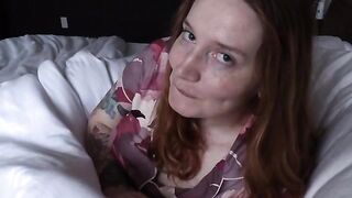 Bettie Bondage warms up in bed, teasing with her seductive charm
